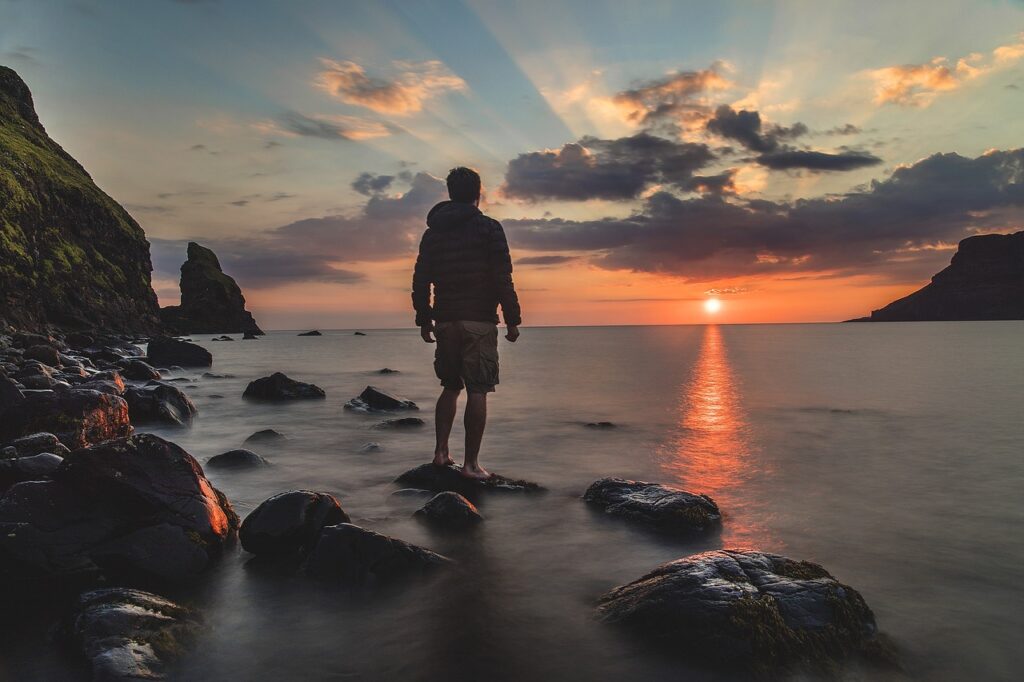 man, beach, sunset-1854195.jpg